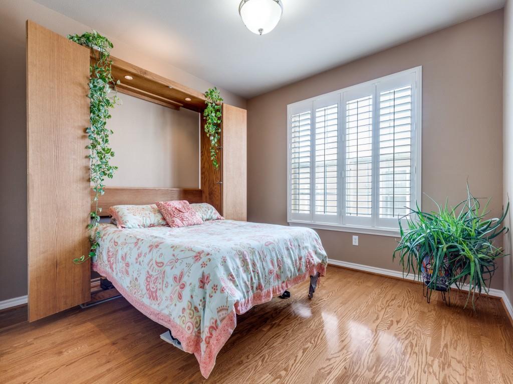 15741 Seabolt Place, Unit 28 Addison, TX 75001 - Photo 17 of 37 Bedroom with light wood-type flooring and baseboards