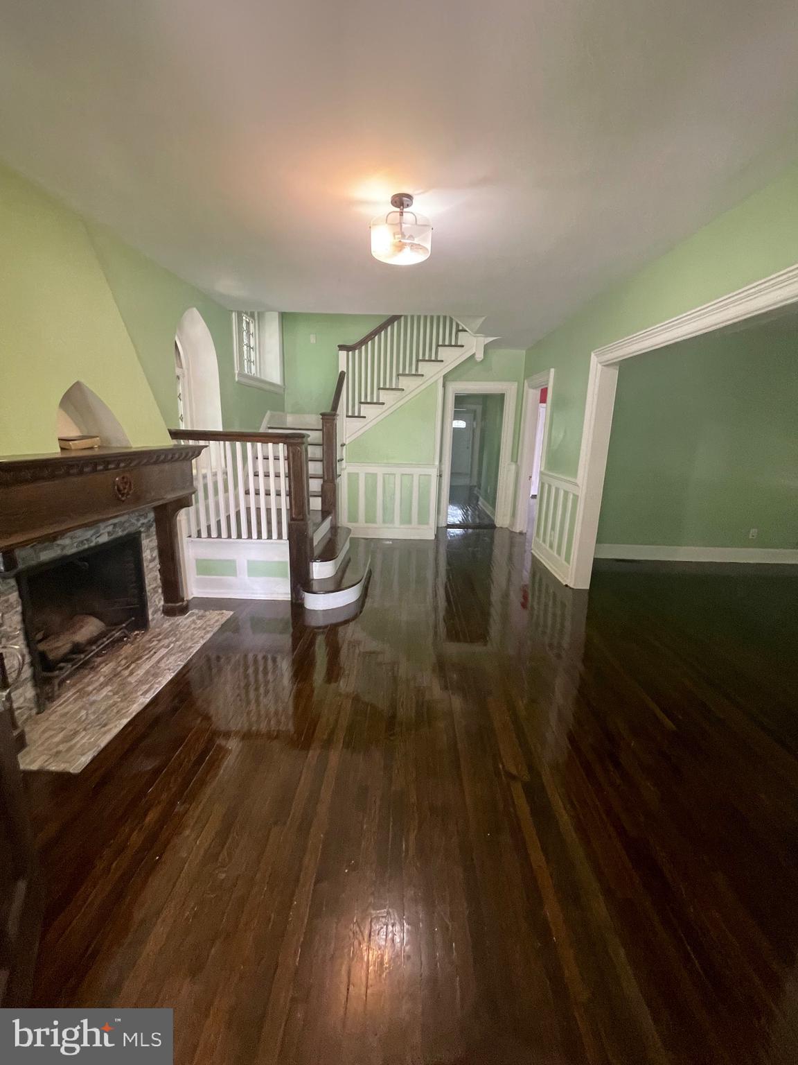 6416 Overbrook Avenue Philadelphia, PA 19151 - Photo 3 of 18 a view of a livingroom with furniture and a fireplace