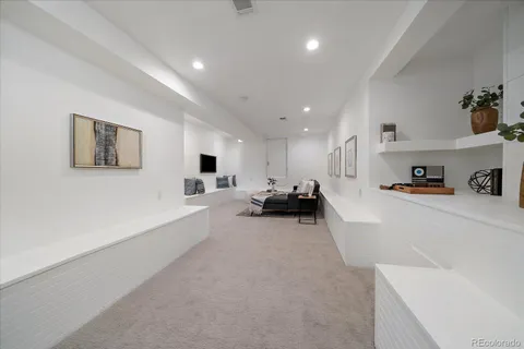 a living room with furniture and a couch