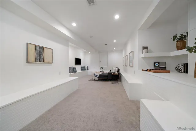 a living room with furniture and a couch