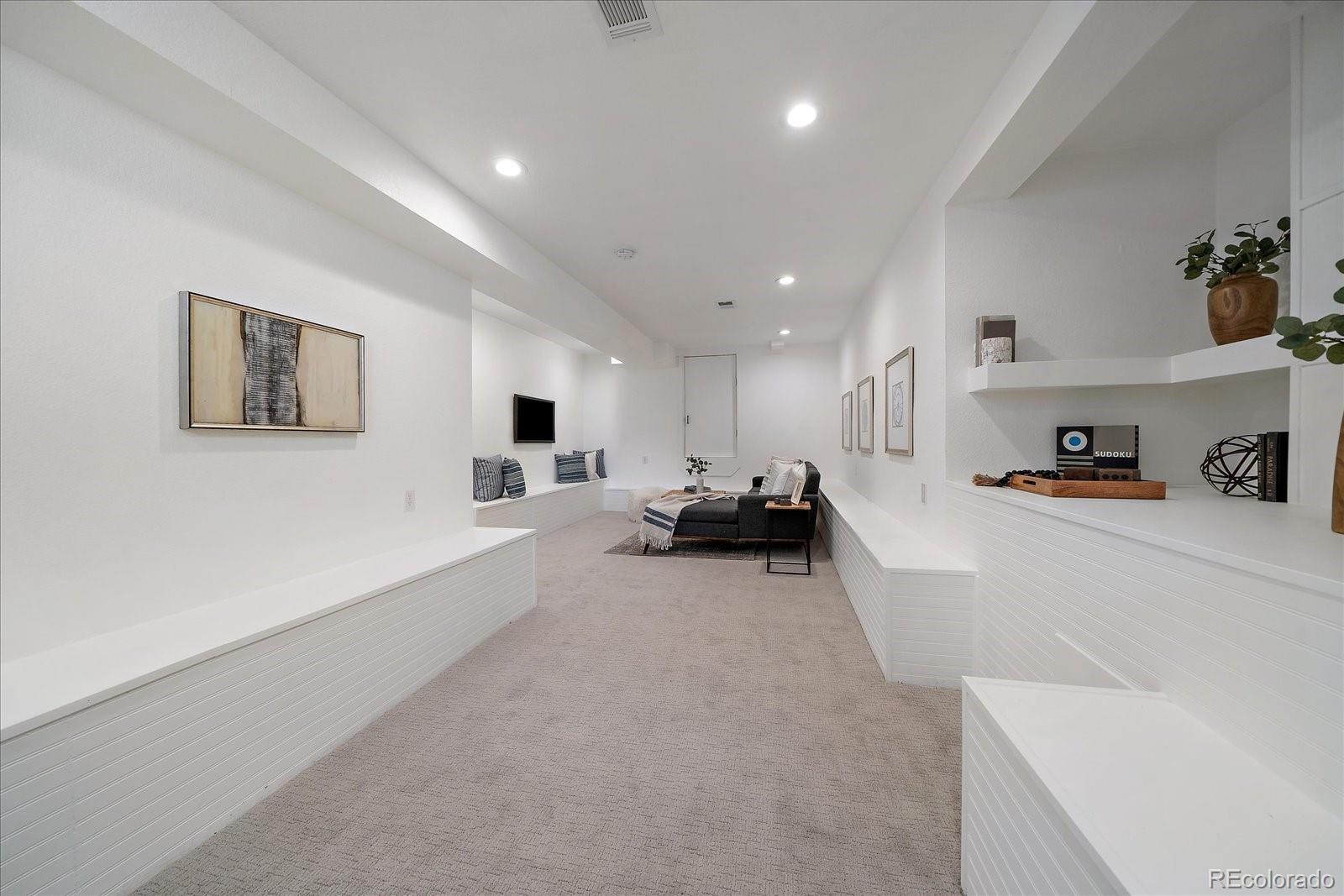 9200 Grandview Avenue Arvada, CO 80002 - Photo 26 of 45 a living room with furniture and a couch