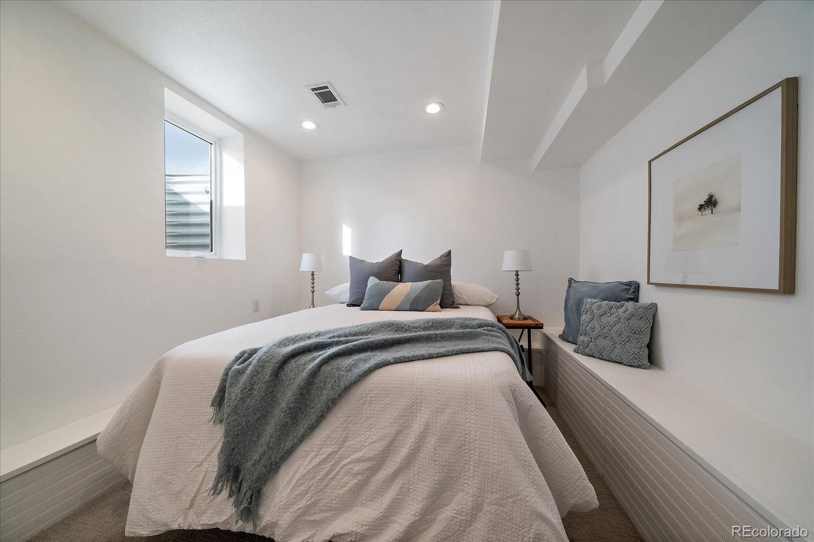 9200 Grandview Avenue Arvada, CO 80002 - Photo 29 of 45 a bedroom with a bed and a window