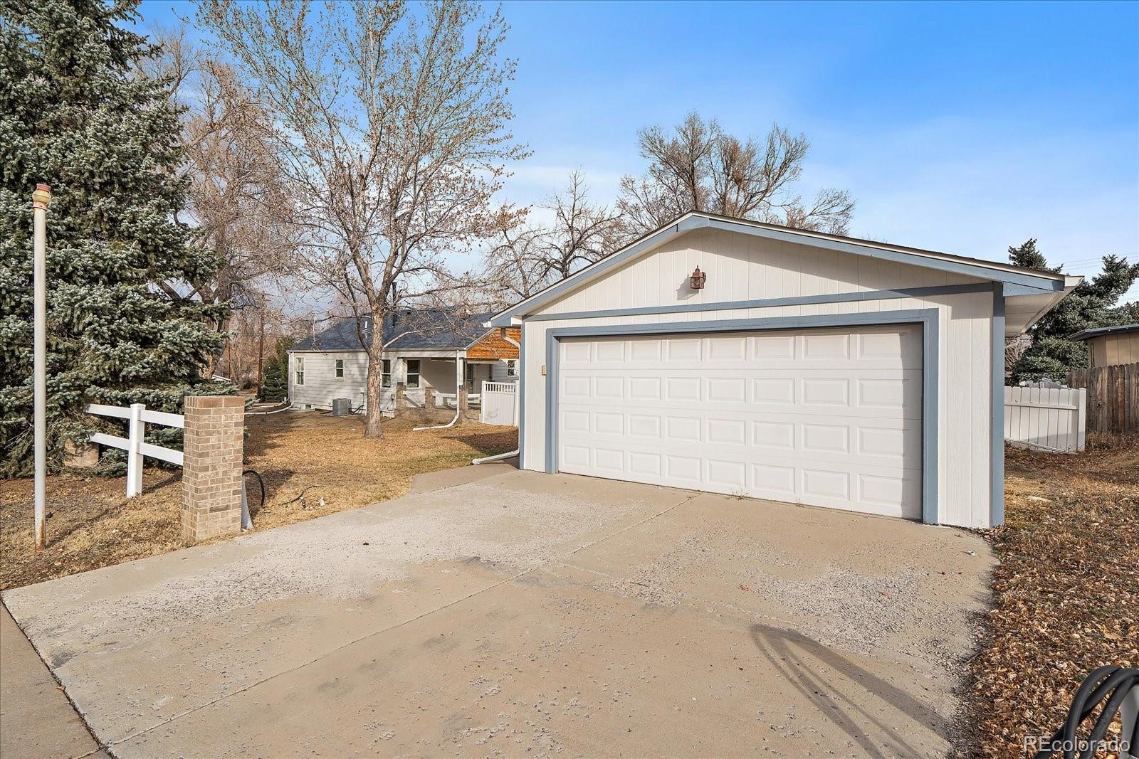 9200 Grandview Avenue Arvada, CO 80002 - Photo 38 of 45 a view of a house with a outdoor space