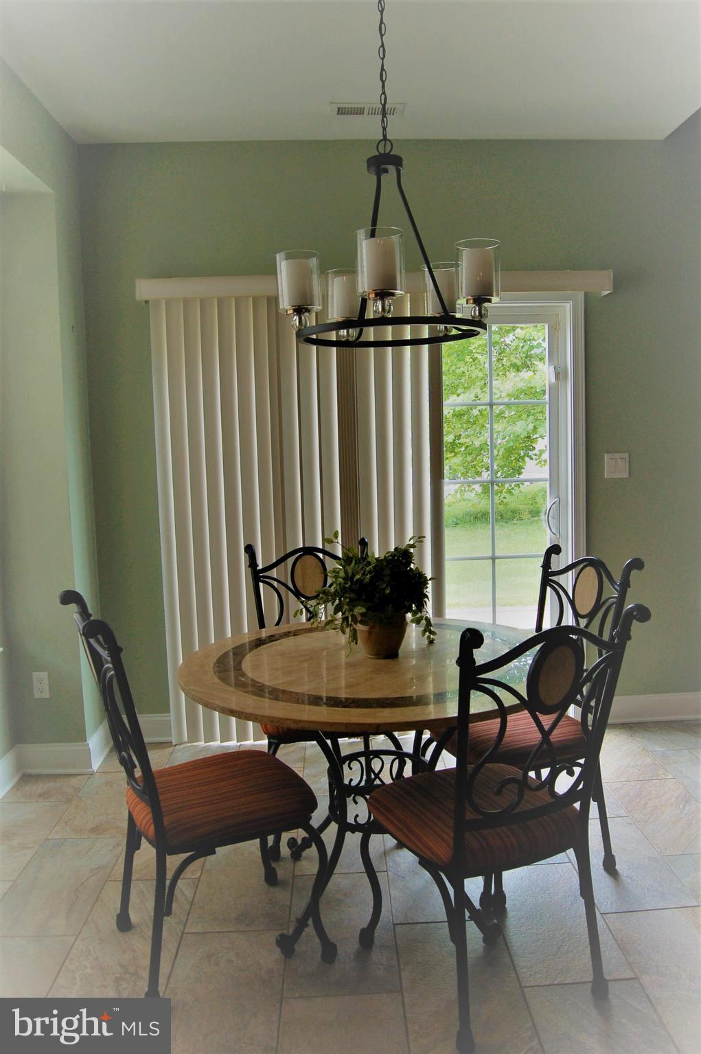 241 Stoyer Road Coatesville, PA 19320 - Photo 17 of 57 Kitchen dining area with slider to patio & yard