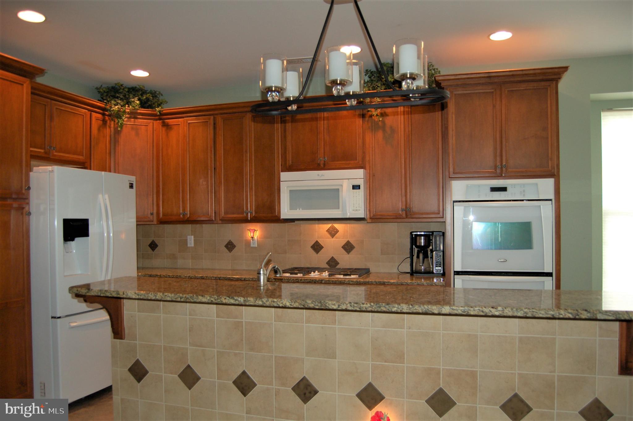241 Stoyer Road Coatesville, PA 19320 - Photo 4 of 57 Gourmet Kitchen w/double wall ovens & cooktop