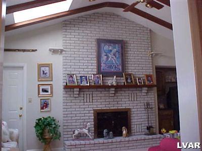 492 Cherry Hill Road Nazareth, PA 18064 - Photo 14 of 21 CATHEDRAL CEILING IN FAMILY ROMM WITH A WONDERFUL FIRE PLACE