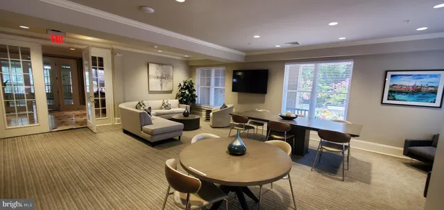 a kitchen with granite countertop a refrigerator and a stove