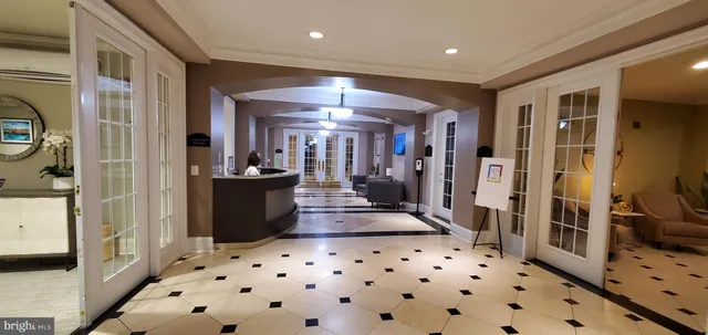 a room with furniture a fireplace and flat screen tv