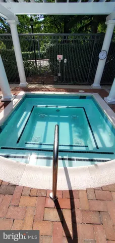 a view of a garden with a fountain