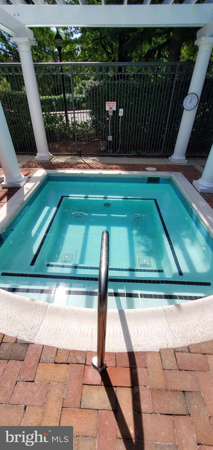 11800 Old Georgetown Road, Unit 1103 Rockville, MD 20852 - Photo 10 of 29 a view of swimming pool with patio