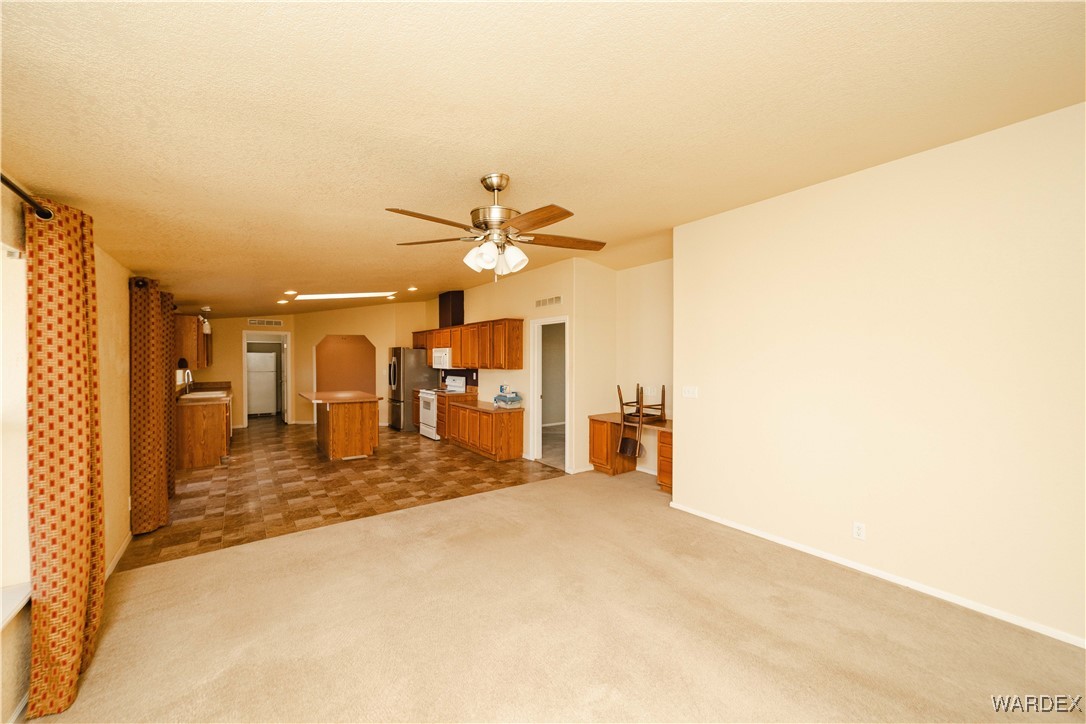 3375 West Rancho Road Golden Valley, AZ 86413 - Photo 15 of 33 a view of a room with a ceiling fan