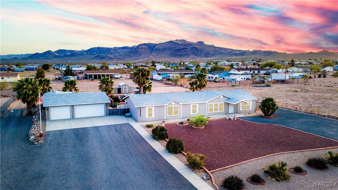 3375 West Rancho Road Golden Valley, AZ 86413 - Photo 2 of 33 an aerial view of residential houses and outdoor space