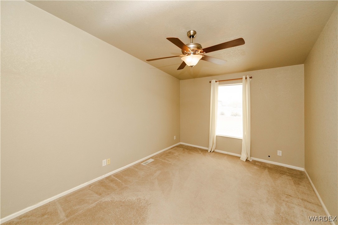 3375 West Rancho Road Golden Valley, AZ 86413 - Photo 29 of 33 a view of an empty room