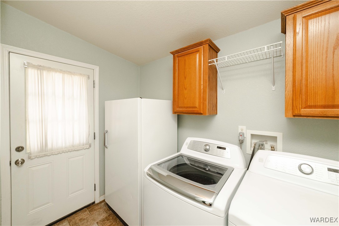 3375 West Rancho Road Golden Valley, AZ 86413 - Photo 33 of 33 a utility room with sink dryer and washer