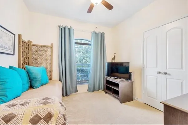 a spacious bathroom with a shower and a sink