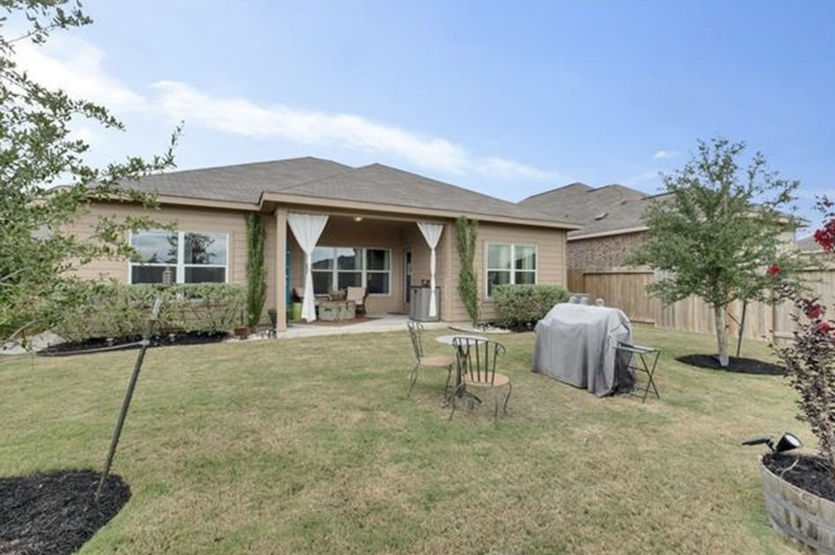 13405 Clara Martin Road Manor, TX 78653 - Photo 24 of 26 Back of property featuring a patio