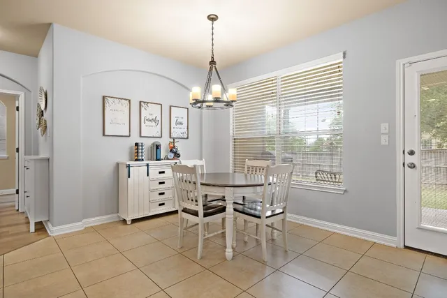 a dining room well furnished