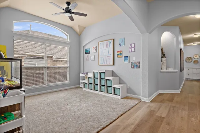 a bedroom with furniture and window