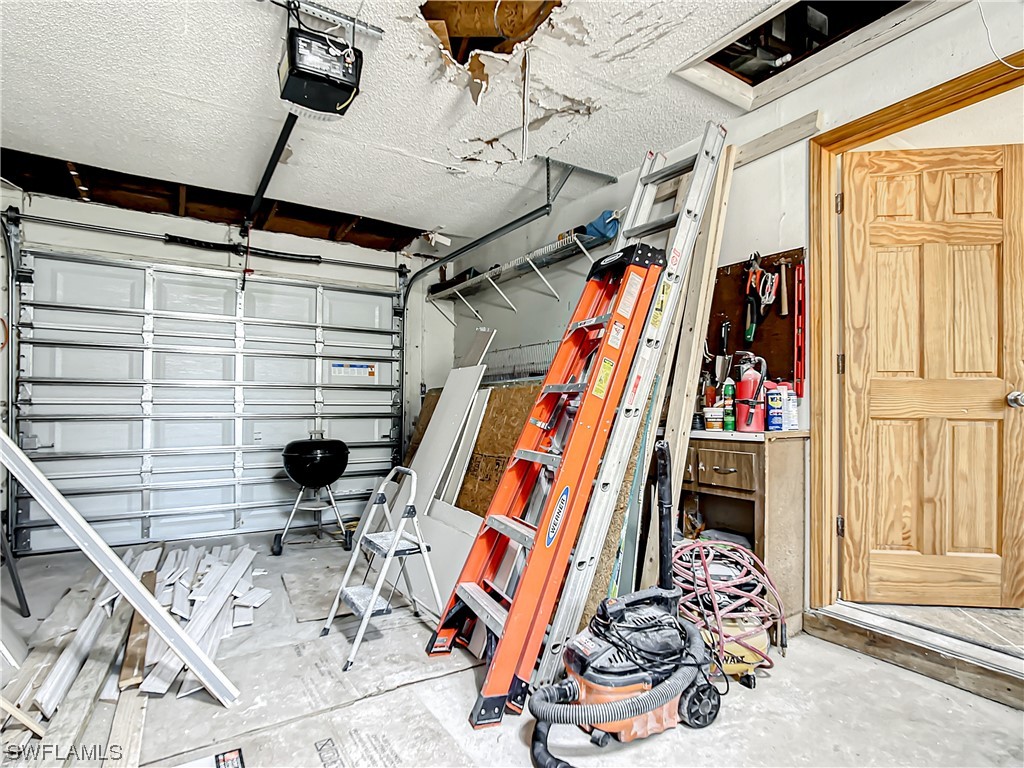 207 Redfish Road Fort Myers Beach, FL 33931 - Photo 36 of 50 a view of walk in closet with clothes and shoes