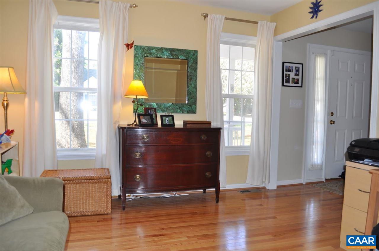 840 Harris Road Charlottesville, VA 22902 - Photo 3 of 11 a living room with furniture window and wooden floor