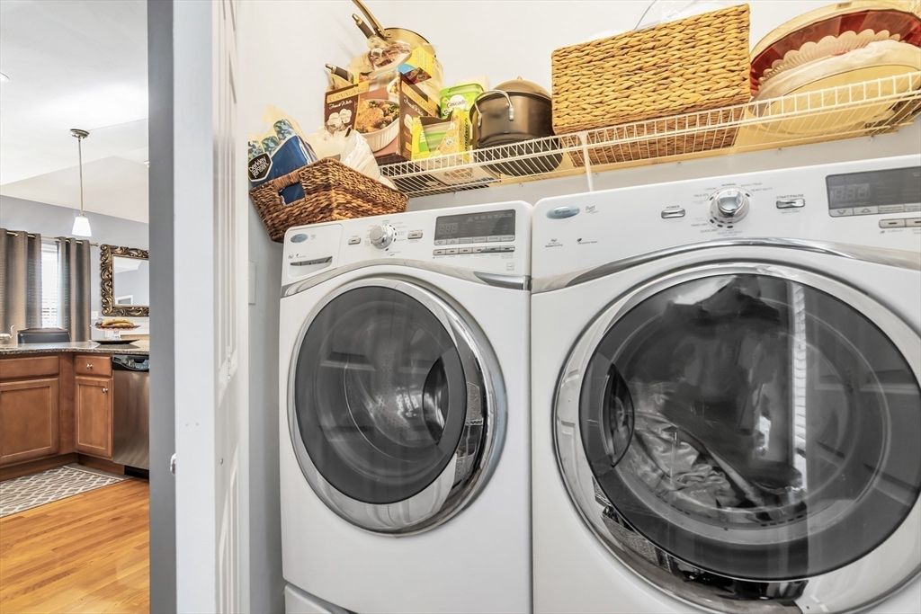 14 Tedesco Road Methuen, MA 01844 - Photo 11 of 40 a view of a storage and utility room with washer and dryer