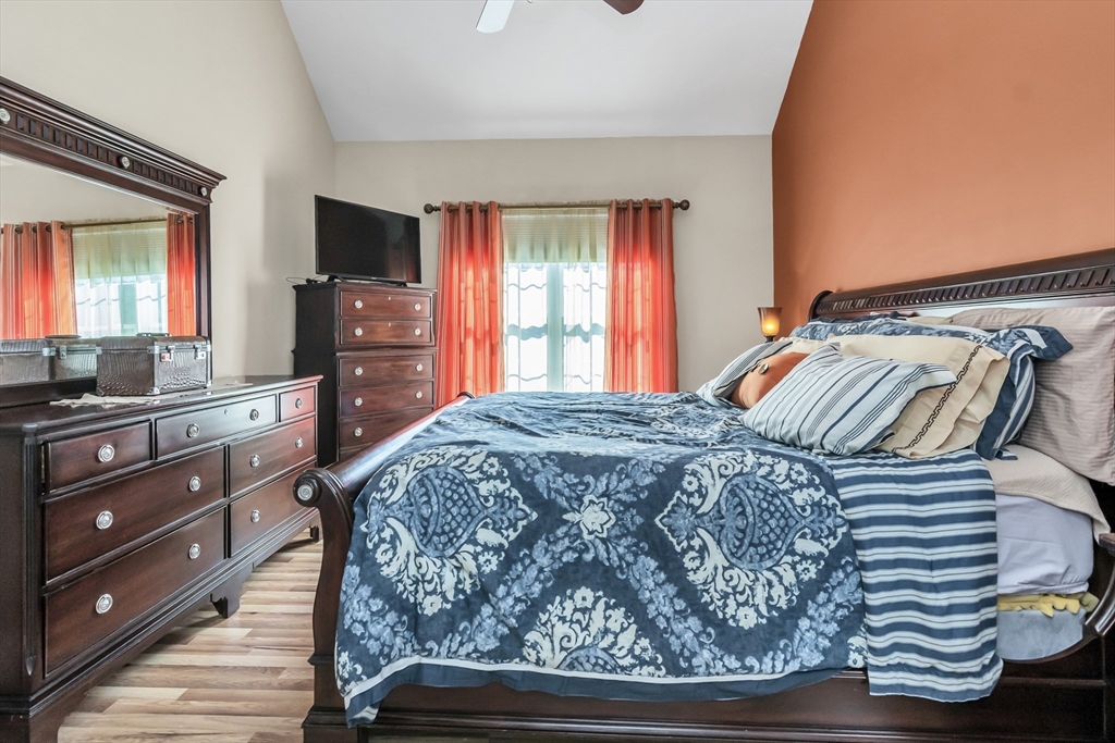 14 Tedesco Road Methuen, MA 01844 - Photo 12 of 40 a bedroom with a bed and a flat tv screen on dresser