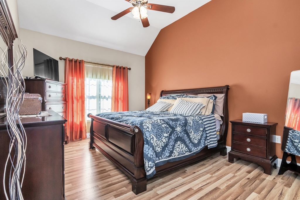 14 Tedesco Road Methuen, MA 01844 - Photo 13 of 40 a bedroom with a bed and wooden floor