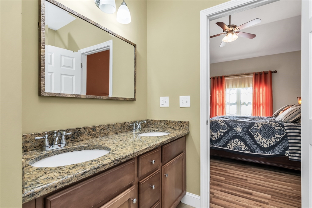 14 Tedesco Road Methuen, MA 01844 - Photo 14 of 40 a en suite bathroom with a granite countertop sink and a mirror