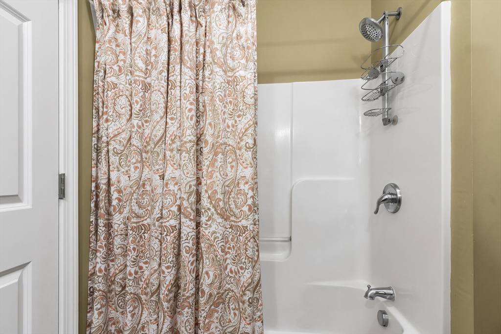 14 Tedesco Road Methuen, MA 01844 - Photo 16 of 40 a bathroom with a shower curtain and a shower curtain