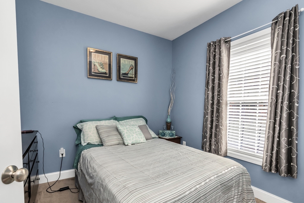 14 Tedesco Road Methuen, MA 01844 - Photo 17 of 40 a bedroom with a bed and a window