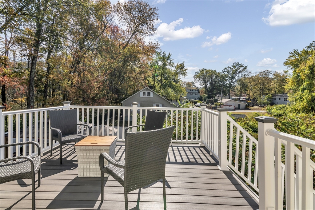 14 Tedesco Road Methuen, MA 01844 - Photo 26 of 40 a view of a chair and table on the deck