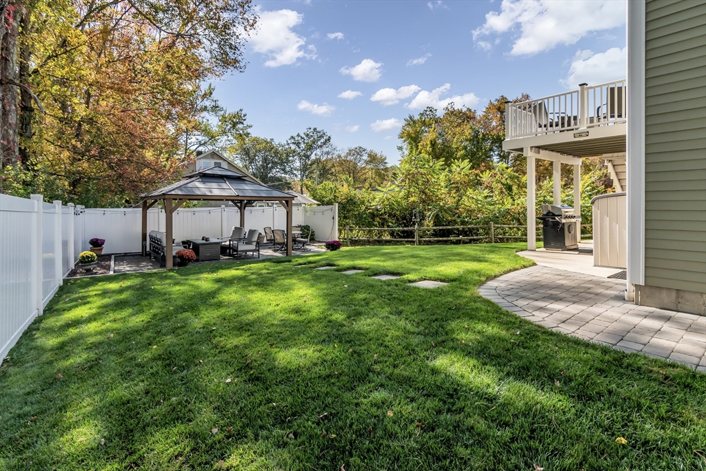 14 Tedesco Road Methuen, MA 01844 - Photo 30 of 40 a view of a house with a big yard and potted plants