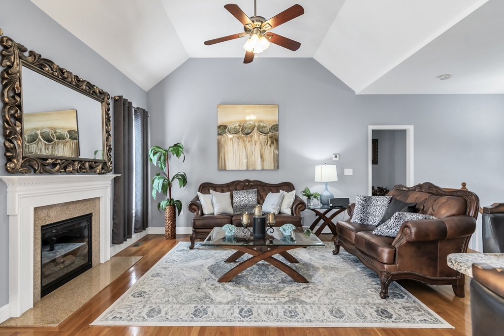 14 Tedesco Road Methuen, MA 01844 - Photo 3 of 40 a living room with furniture and a fireplace