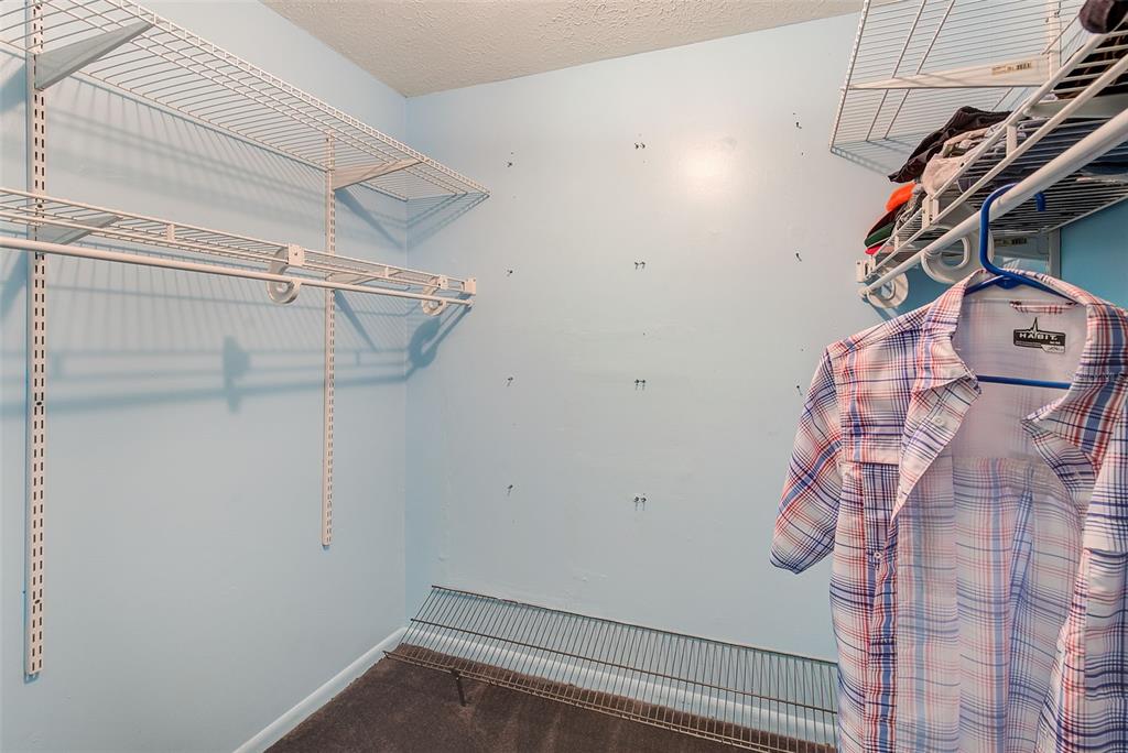 4707 East Temple Heights Road Tampa, FL 33617 - Photo 18 of 54 a view of walk in closet