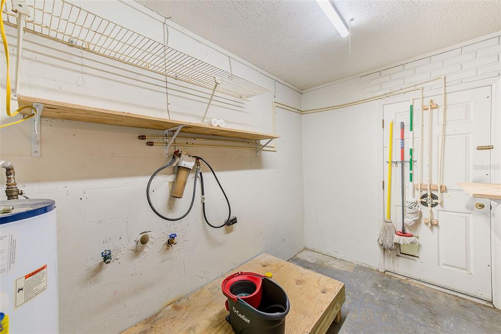 4707 East Temple Heights Road Tampa, FL 33617 - Photo 26 of 54 a bathroom with a sink and a mirror