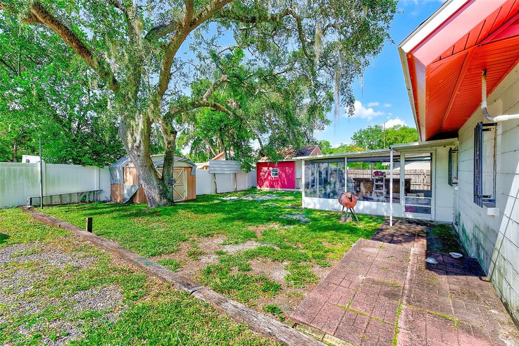 4707 East Temple Heights Road Tampa, FL 33617 - Photo 31 of 54 a view of a pathway with a patio