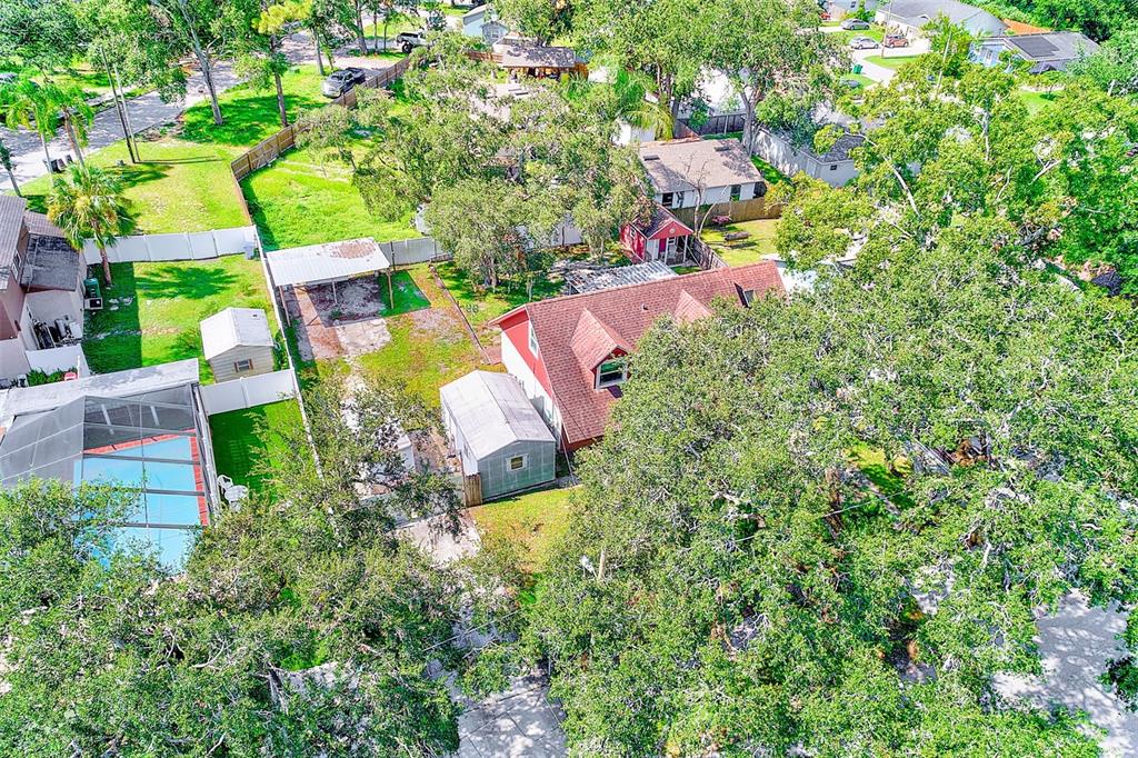 4707 East Temple Heights Road Tampa, FL 33617 - Photo 47 of 54 an aerial view of a house with a yard basket ball court and outdoor seating