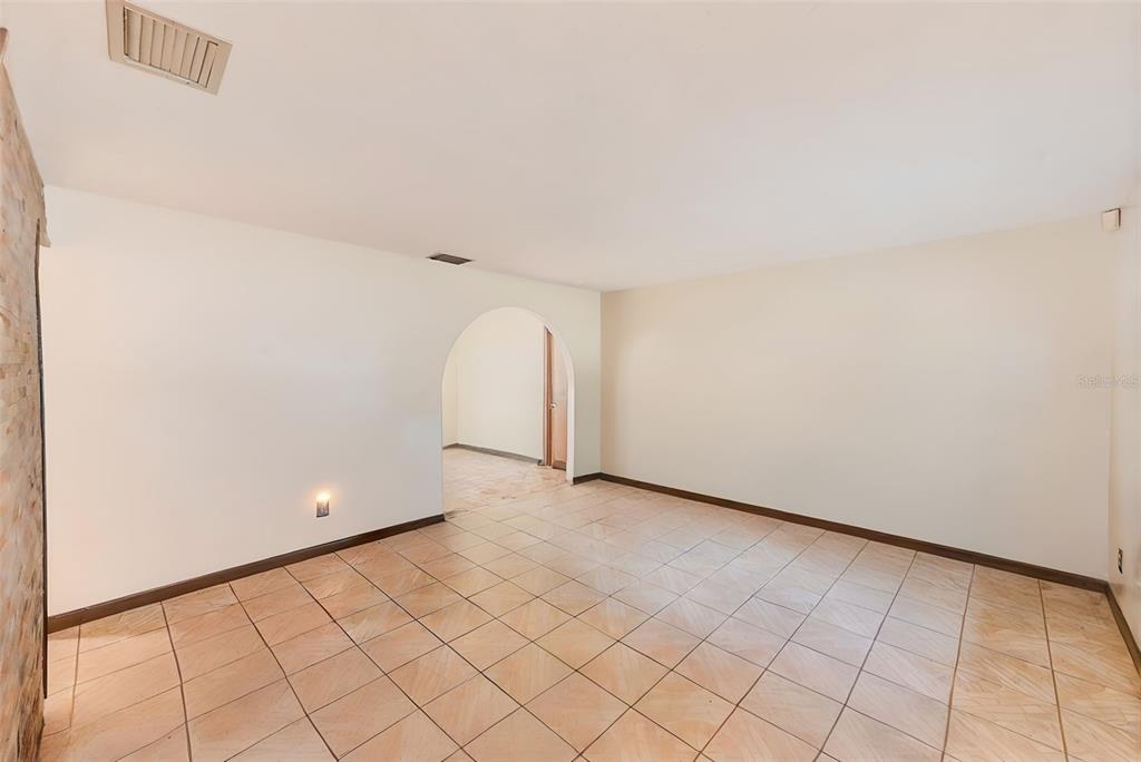 4707 East Temple Heights Road Tampa, FL 33617 - Photo 5 of 54 a view of an empty room