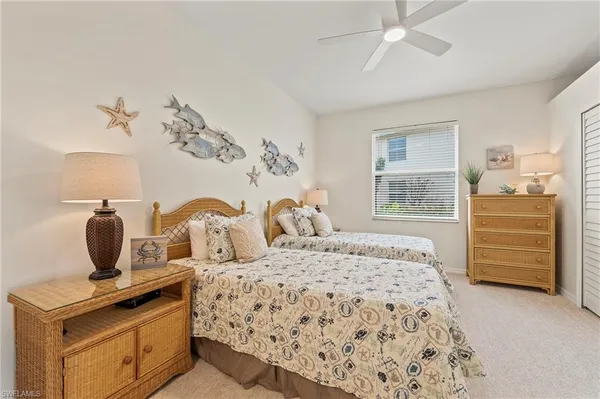 a bedroom with a bed and furniture