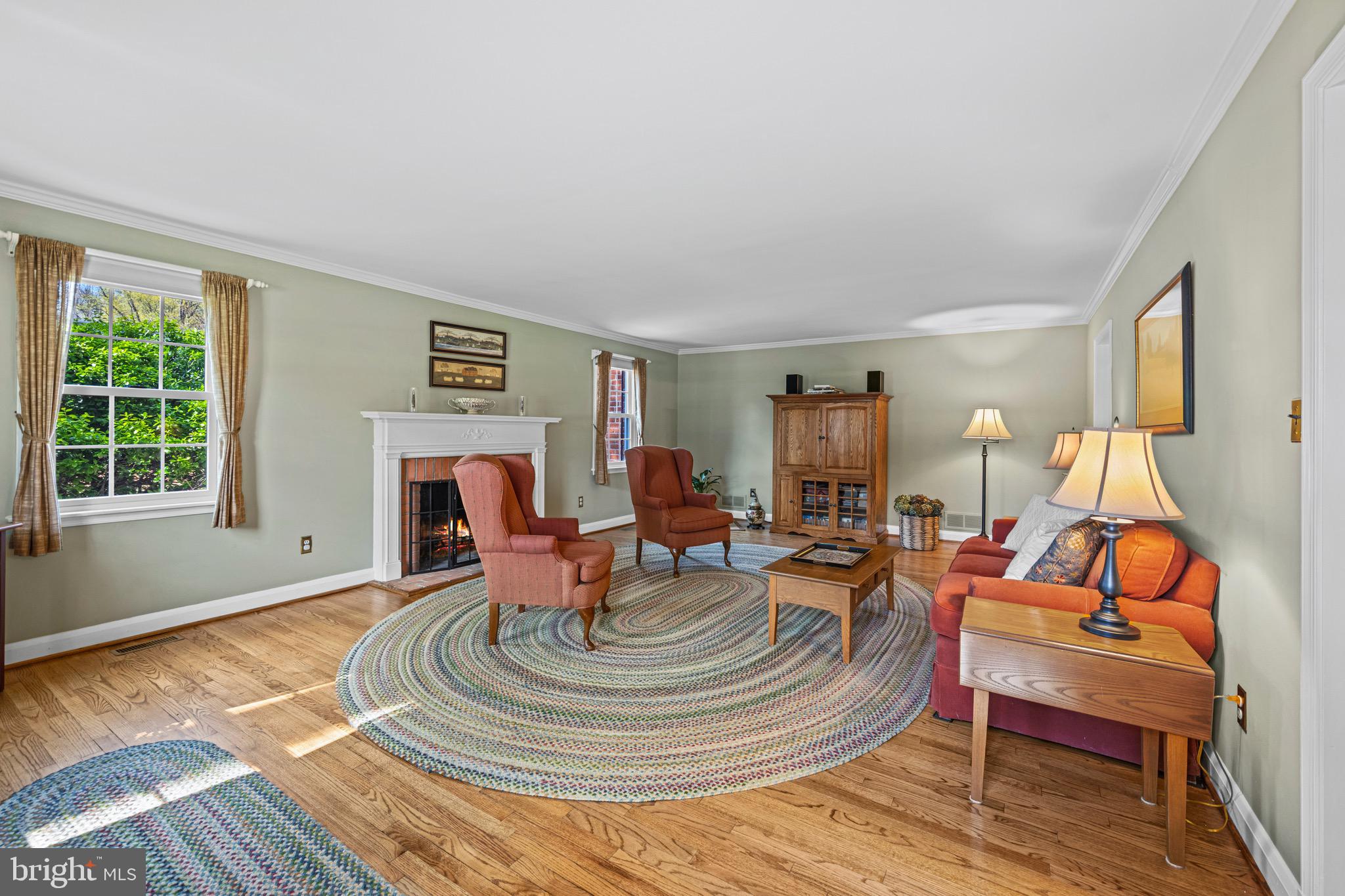 13707 Killarney Court Phoenix, MD 21131 - Photo 17 of 54 Living room with wood burning fireplace