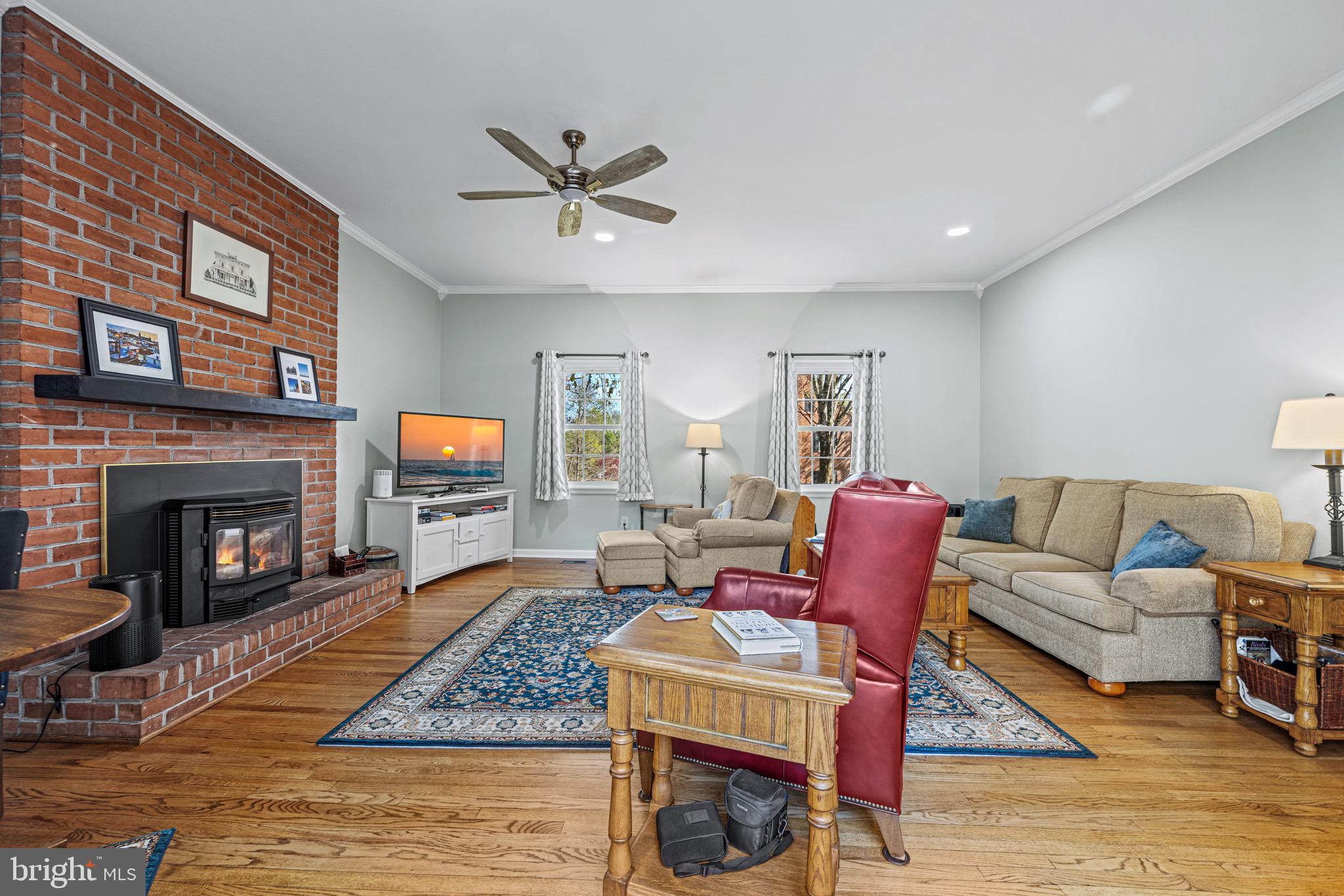 13707 Killarney Court Phoenix, MD 21131 - Photo 22 of 54 Den with pellet stove