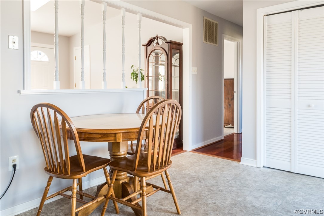 7807 Drexelbrook Road Chesterfield, VA 23832 - Photo 18 of 37 a view of a dining room with furniture and window