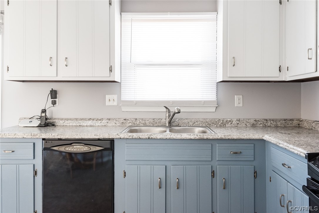 7807 Drexelbrook Road Chesterfield, VA 23832 - Photo 20 of 37 a kitchen with granite countertop white cabinets and a sink