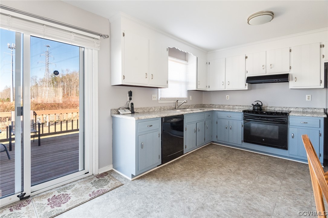 7807 Drexelbrook Road Chesterfield, VA 23832 - Photo 21 of 37 a kitchen with a stove sink and cabinets