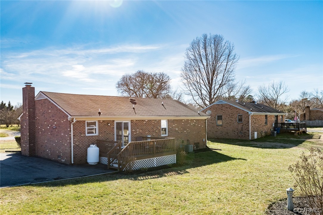 7807 Drexelbrook Road Chesterfield, VA 23832 - Photo 34 of 37 a view of a white house with a big yard and large tree