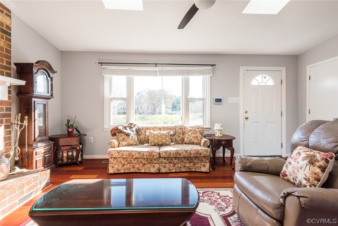 7807 Drexelbrook Road Chesterfield, VA 23832 - Photo 10 of 37 a living room with furniture and a large window