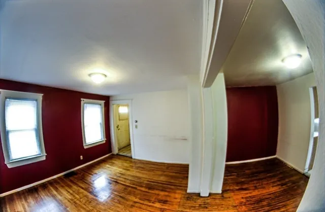 a view of an empty room and window