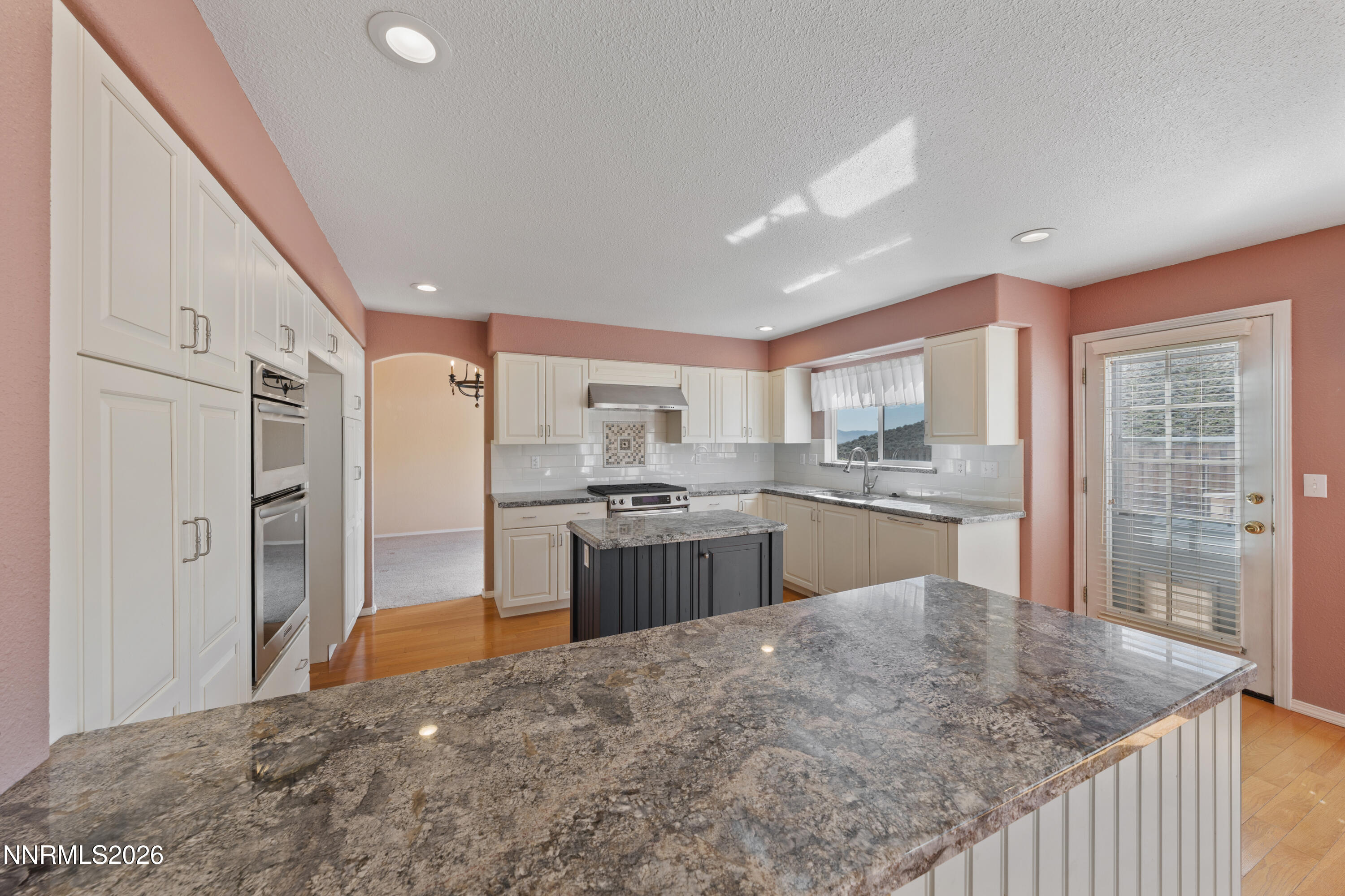 5524 Tappan Drive Reno, NV 89523 - Photo 20 of 70 a kitchen with stainless steel appliances granite countertop a refrigerator a sink a stove and oven