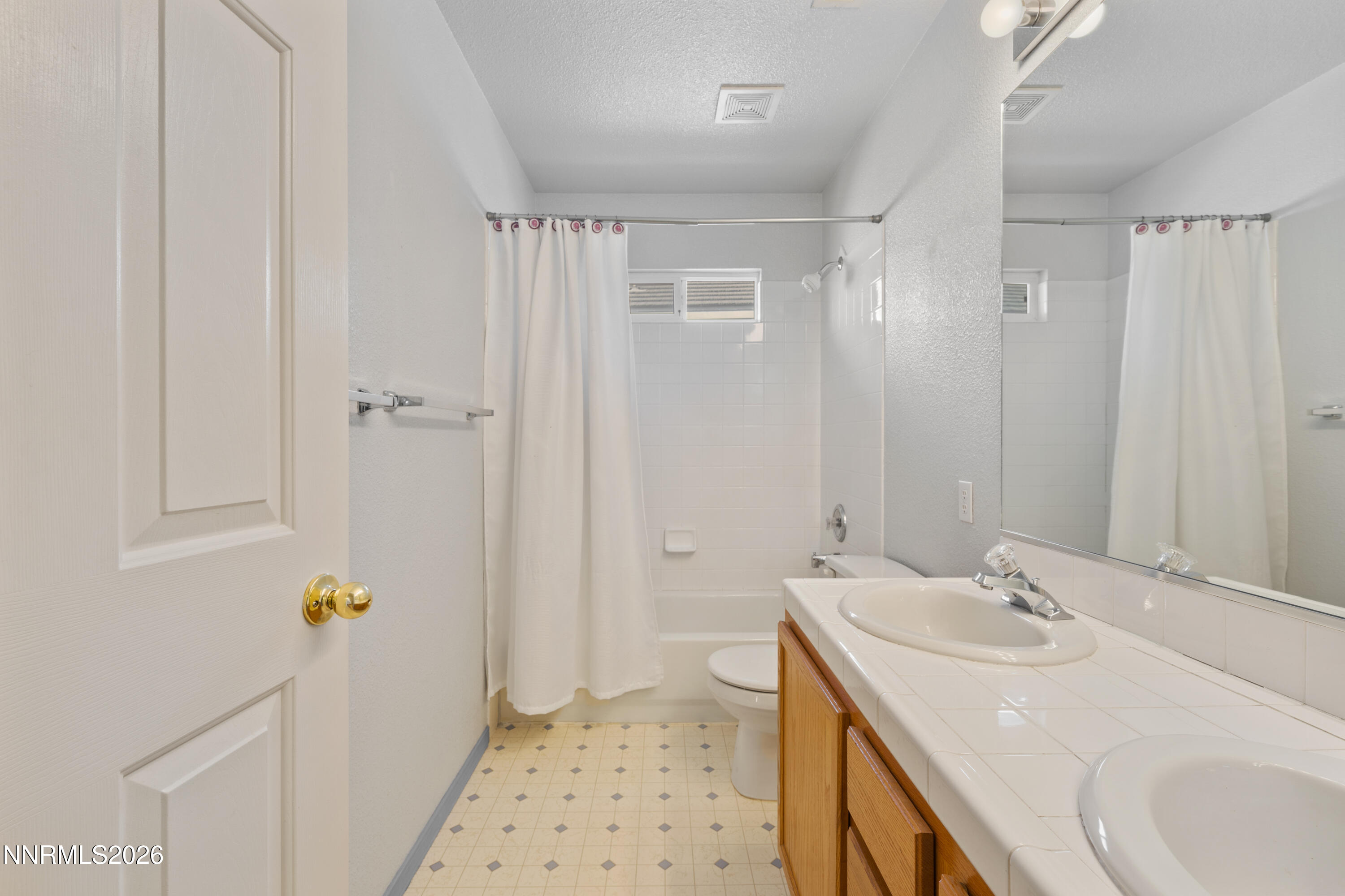 5524 Tappan Drive Reno, NV 89523 - Photo 42 of 70 a bathroom with a sink and a mirror