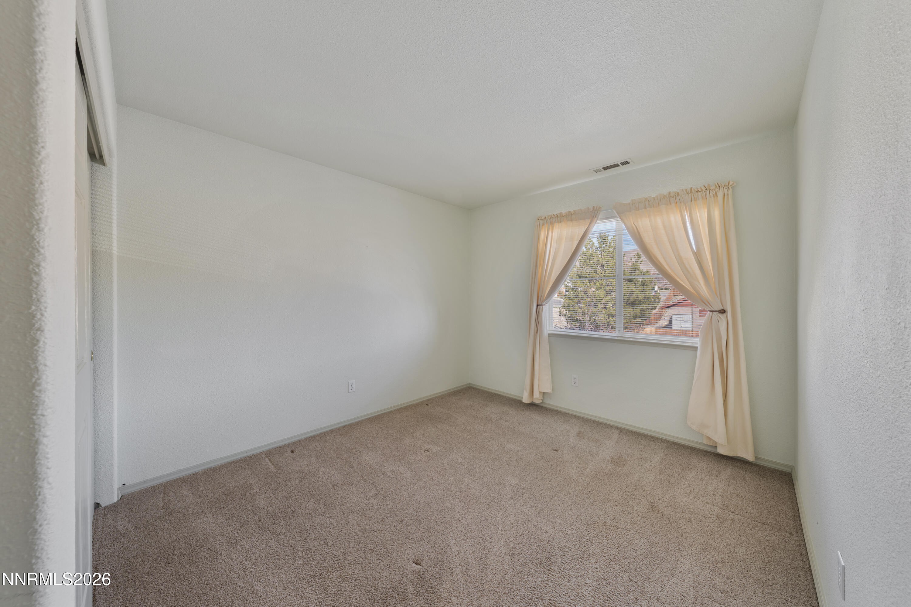 5524 Tappan Drive Reno, NV 89523 - Photo 44 of 70 an empty room with a window